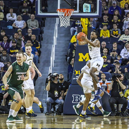Ignas Brazdeikis (13) and Zavier Simpson (3)