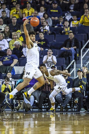 Isaiah Livers (4) and Charles Matthews (1)