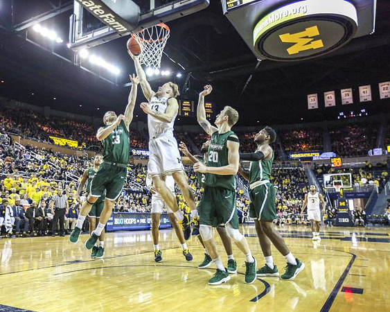 Ignas Brazdeikis (13) and Zavier Simpson (3)