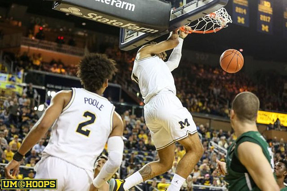 Jordan Poole (2) and Isaiah Livers (4)