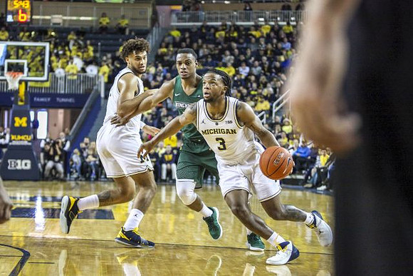 Isaiah Livers (4) and Zavier Simpson (3)