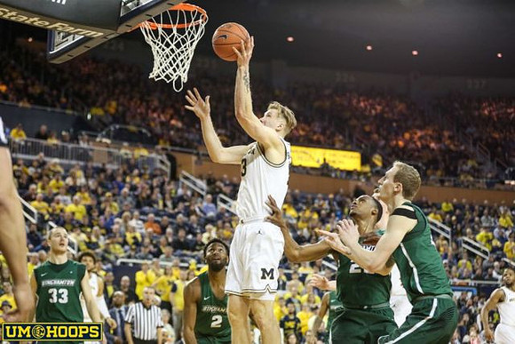 Ignas Brazdeikis (13), Isaiah Livers (4), and Zavier Simpson (3)