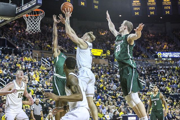 Jon Teske (15), Charles Matthews (1), and Ignas Brazdeikis (13)