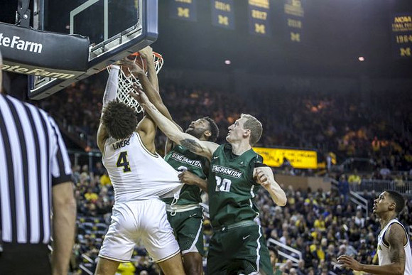 Isaiah Livers (4) and Charles Matthews (1)