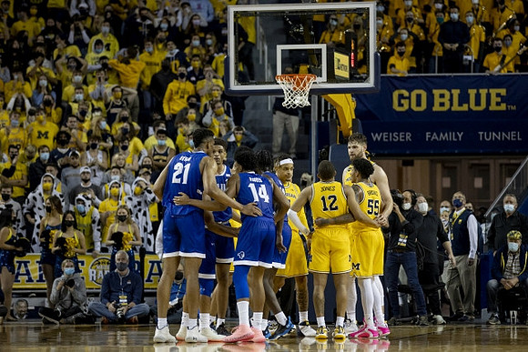 Terrance Williams II (5), DeVante' Jones (12), Eli Brooks (55), and Hunter Dickinson (1)