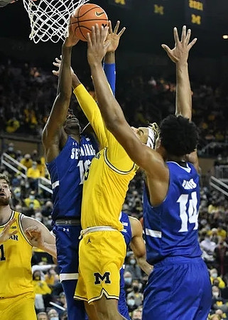 Hunter Dickinson (1) and Terrance Williams II (5)