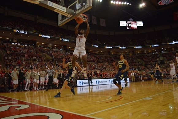 Duncan Robinson (22) and Eli Brooks (55)