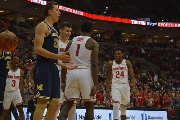 Duncan Robinson (22) and Eli Brooks (55)
