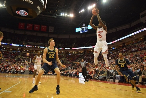Duncan Robinson (22) and Muhammad-Ali Abdur-Rahkman (12)