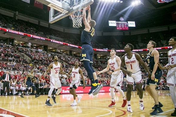 Charles Matthews (1), Moritz Wagner (13), and Duncan Robinson (22)