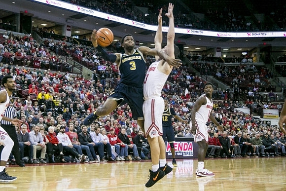 Zavier Simpson (3) and Muhammad-Ali Abdur-Rahkman (12)