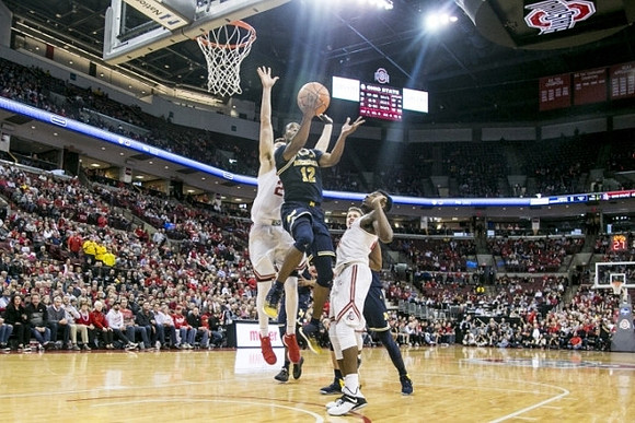 Muhammad-Ali Abdur-Rahkman (12) and Moritz Wagner (13)
