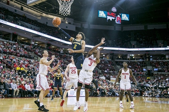 Jordan Poole (2) and Isaiah Livers (4)