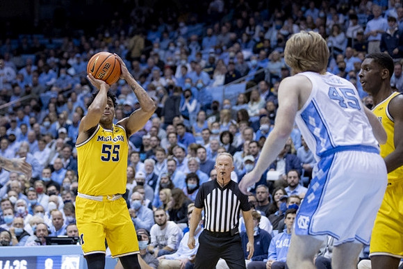 Eli Brooks (55) and Moussa Diabate (14)