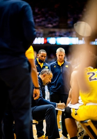 Juwan Howard, Howard Eisley, Jay Smith, and Brandon Johns Jr. (23)