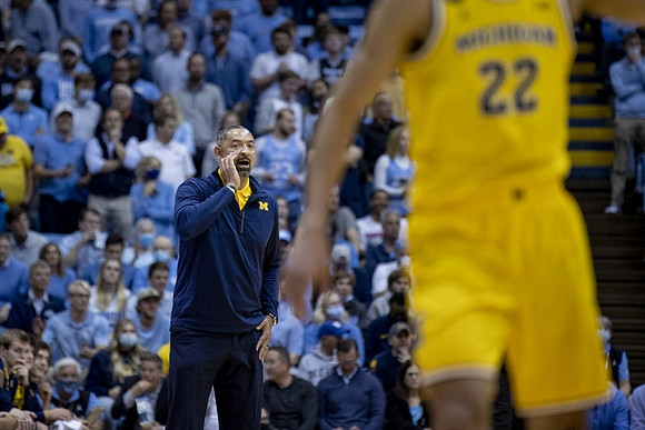 Juwan Howard and Caleb Houstan (22)