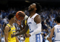 Caleb Houstan (22) and Moussa Diabate (14)