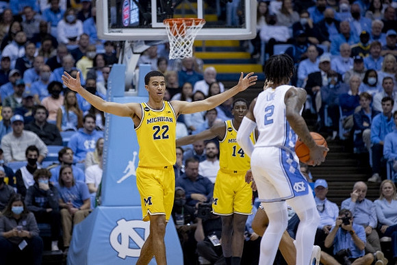 Caleb Houstan (22) and Moussa Diabate (14)