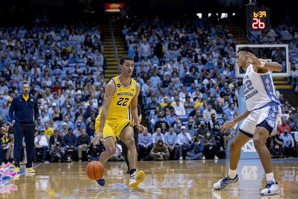 Juwan Howard and Caleb Houstan (22)