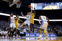 Hunter Dickinson (1) and Moussa Diabate (14)