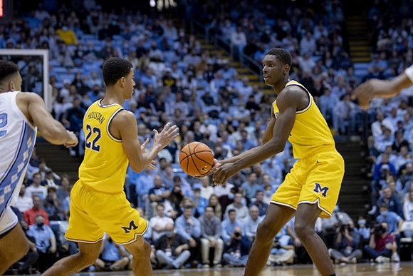 Caleb Houstan (22) and Moussa Diabate (14)