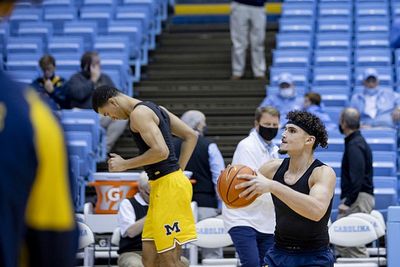 Caleb Houstan (22) and Adrien Nunez (0)