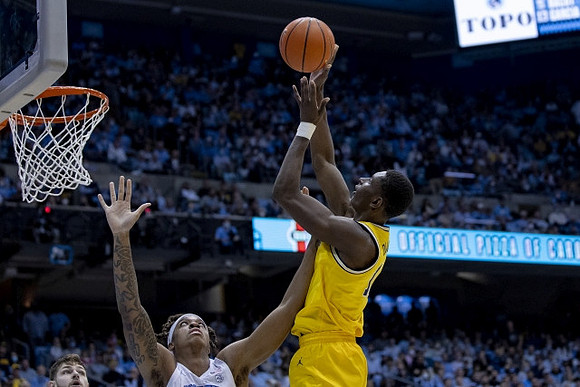 Moussa Diabate (14) and Hunter Dickinson (1)
