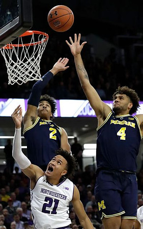 Jordan Poole (2) and Isaiah Livers (4)
