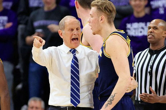 John Beilein, Ignas Brazdeikis (13), and Jon Teske (15)