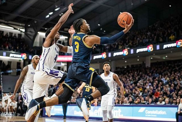 Zavier Simpson (3) and Ignas Brazdeikis (13)