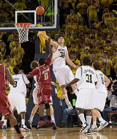 Manny Harris (3), Zack Gibson (32), Laval Lucas-Perry (31), and Zack Novak (0)