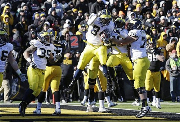 Sione Houma (39), A.J. Williams (84), Fitzgerald Toussaint (28), and Michael Schofield (75)