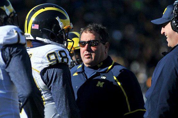 Devin Gardner (98) and Brady Hoke