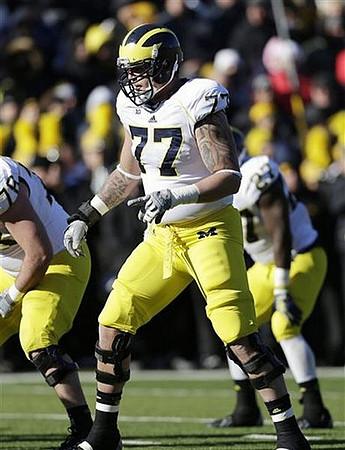 Erik Magnuson (78), Taylor Lewan (77), and Derrick Green (27)
