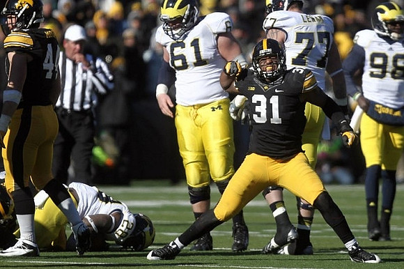 Fitzgerald Toussaint (28), Graham Glasgow (61), Taylor Lewan (77), and Devin Gardner (98)
