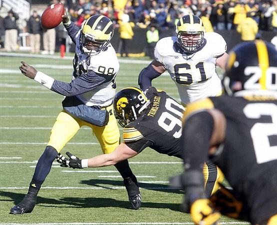 Devin Gardner (98) and Graham Glasgow (61)
