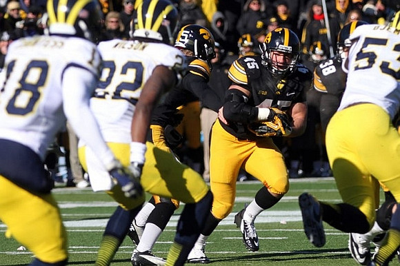 Blake Countess (18), Jarrod Wilson (22), and Mario Ojemudia (53)