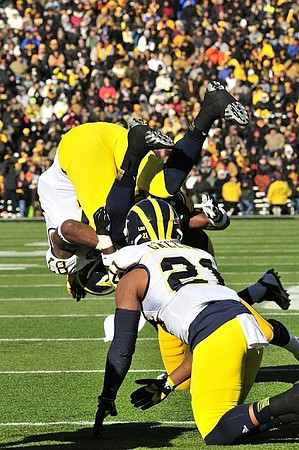 Devin Funchess (87) and Jeremy Gallon (21)