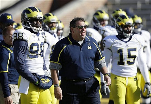 Devin Gardner (98), Brady Hoke, and James Ross (15)