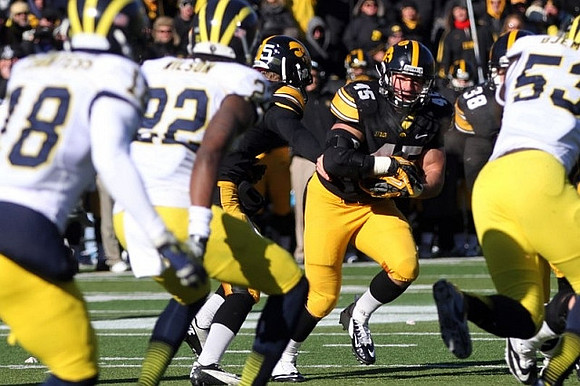 Blake Countess (18), Jarrod Wilson (22), and Mario Ojemudia (53)