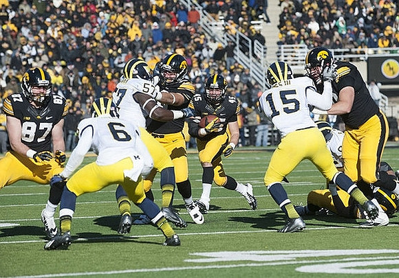 Raymon Taylor (6), Frank Clark (57), and James Ross (15)
