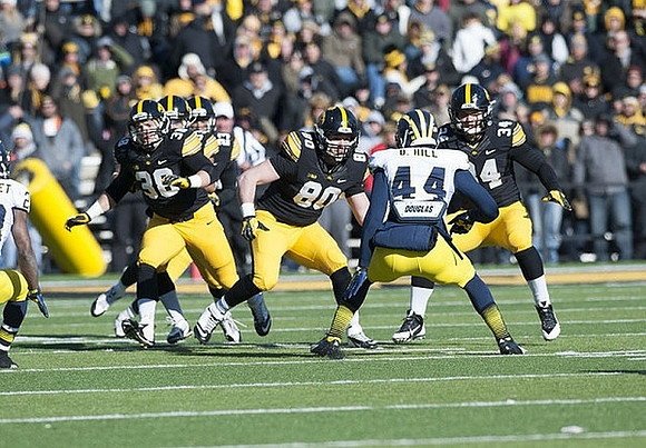 Dennis Norfleet (23) and Delano Hill (44)