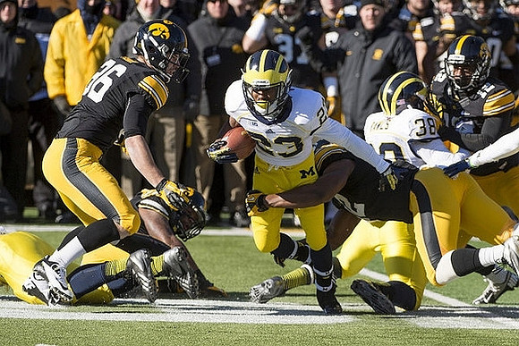 Dennis Norfleet (23) and Thomas Rawls (38)