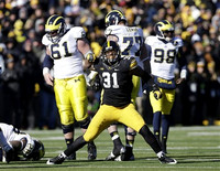 Fitzgerald Toussaint (28), Graham Glasgow (61), Taylor Lewan (77), and Devin Gardner (98)
