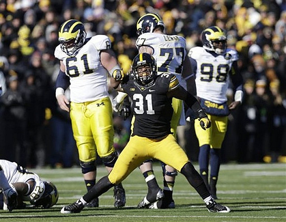 Fitzgerald Toussaint (28), Graham Glasgow (61), Taylor Lewan (77), and Devin Gardner (98)