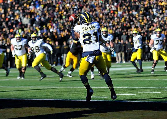Jeremy Gallon (21), Kyle Kalis (67), Fitzgerald Toussaint (28), Devin Gardner (98), and Taylor Lewan (77)