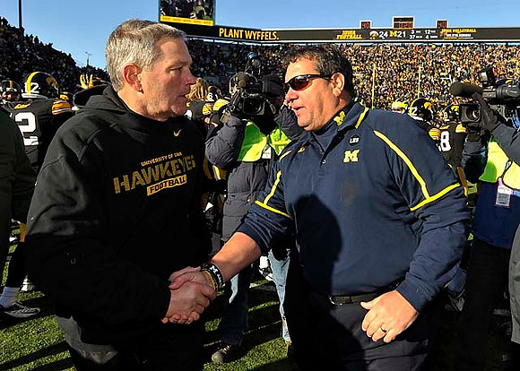 Iowa Head Coach Kirk Ferentz and Brady Hoke