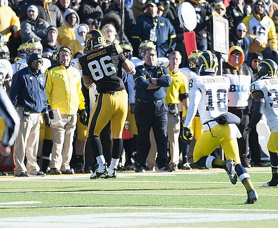 Greg Mattison,  Brady Hoke, Blake Countess (18), and Thomas Gordon (30)