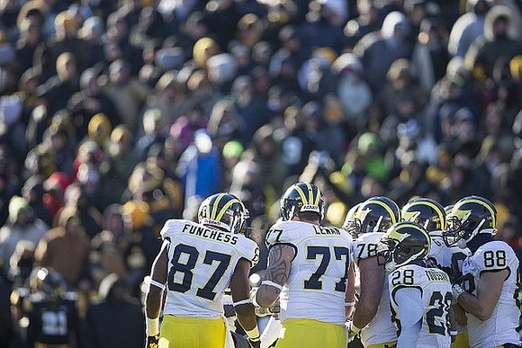 Devin Funchess (87), Taylor Lewan (77), Erik Magnuson (78), Fitzgerald Toussaint (28), Graham Glasgow (61), and Jake Butt (88)