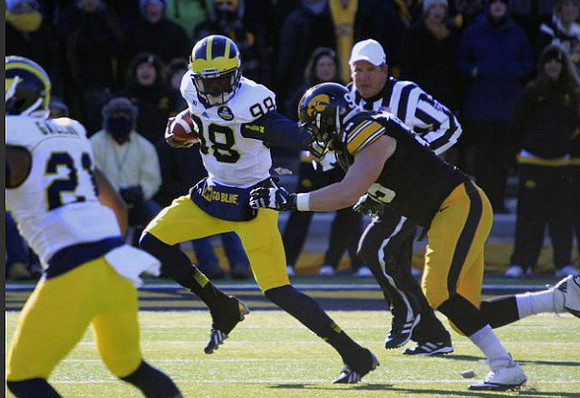 Jeremy Gallon (21) and Devin Gardner (98)